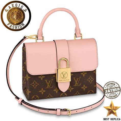 louis vuitton handbag with lock.